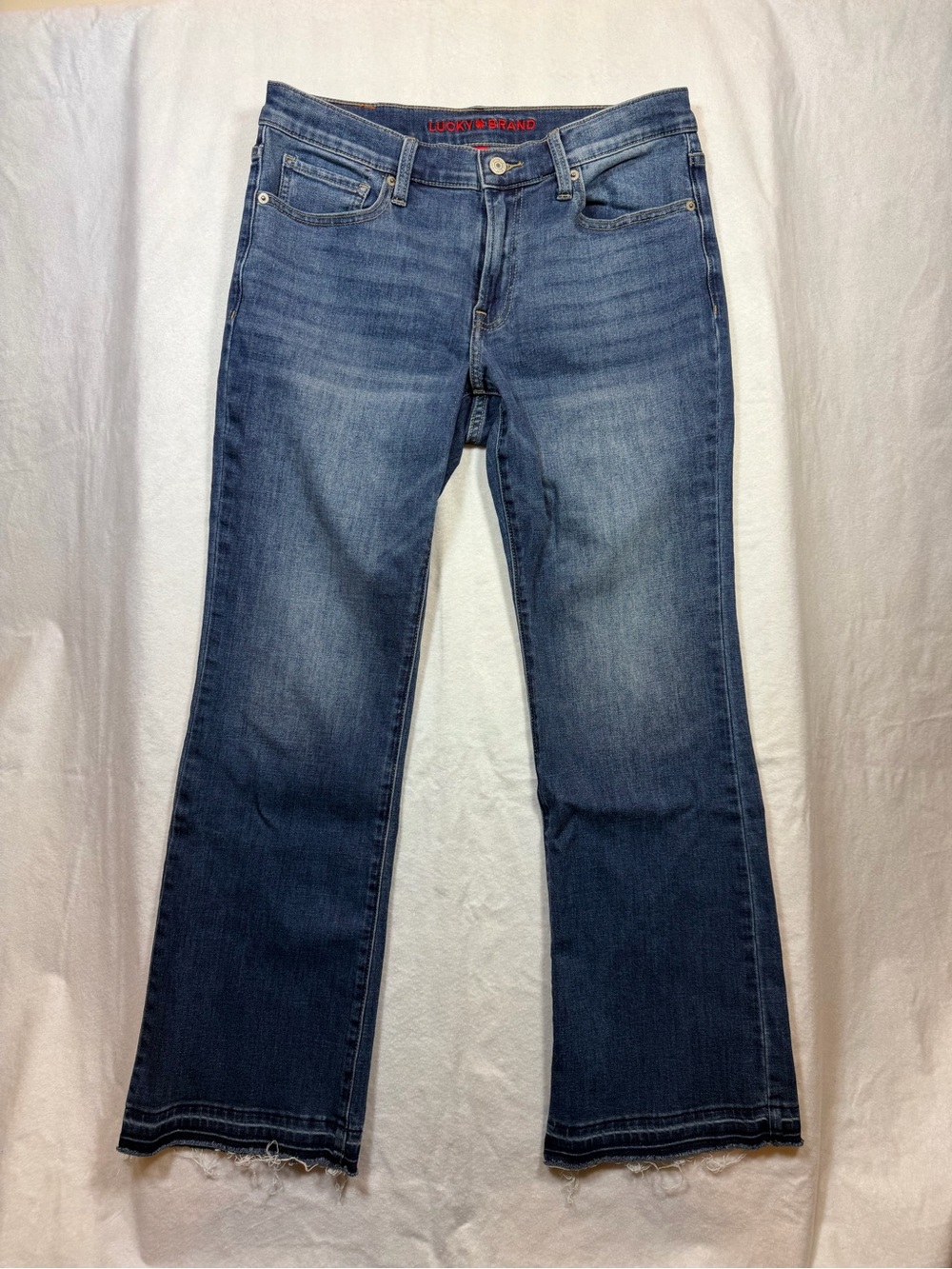 Lucky Brand Women’s Jeans Blue‎ Mid Rise Flare Frayed Raw Hemline Size 10/30